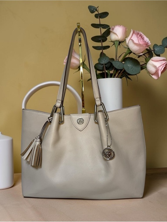 Anne Klein Handbags - Anne Klein Taupe Vegan Pebbled Texture Tote with Lion & Tassel Charms
